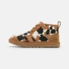UGG NEUMEL COW PRINT - Lace-up Ankle Boots - Chestnut