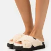 UGG FUZZ SUGAR CROSS SLIDE - Mules - Natural/black
